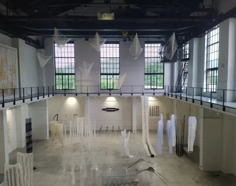 View of contemporary textile installations by artist Eva Damborská in the Turbine Hall at EPO1 Gallery in Trutnov, Czech Republic.