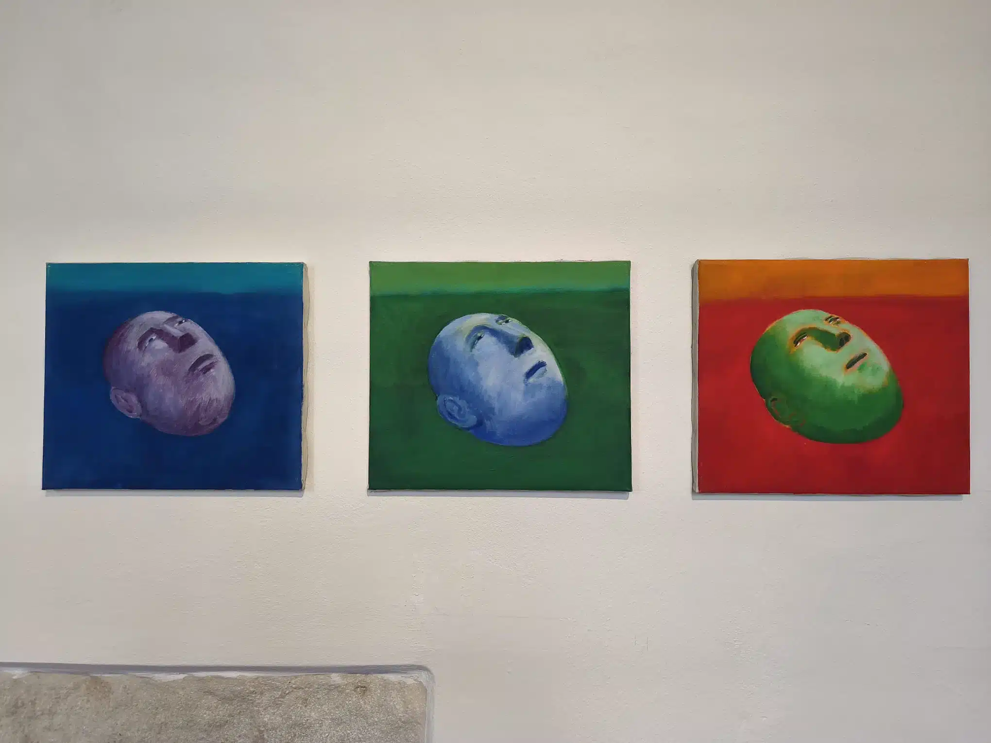 Three colorful portrait paintings by Czech artist Jiří Sopko from the series Untitled 1–3, displayed at GASK in Kutná Hora, featured in a SOLARIS Language School blog post about cultural life in the Czech Republic for foreigners learning Czech.